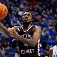 Dec 22, 2021; Lexington, Kentucky, USA; Western Kentucky Hilltoppers guard Josh Anderson (4) goes to the basket during the first half against the Kentucky Wildcats at Rupp Arena at Central Bank Center. Mandatory Credit: Jordan Prather-USA TODAY Sports